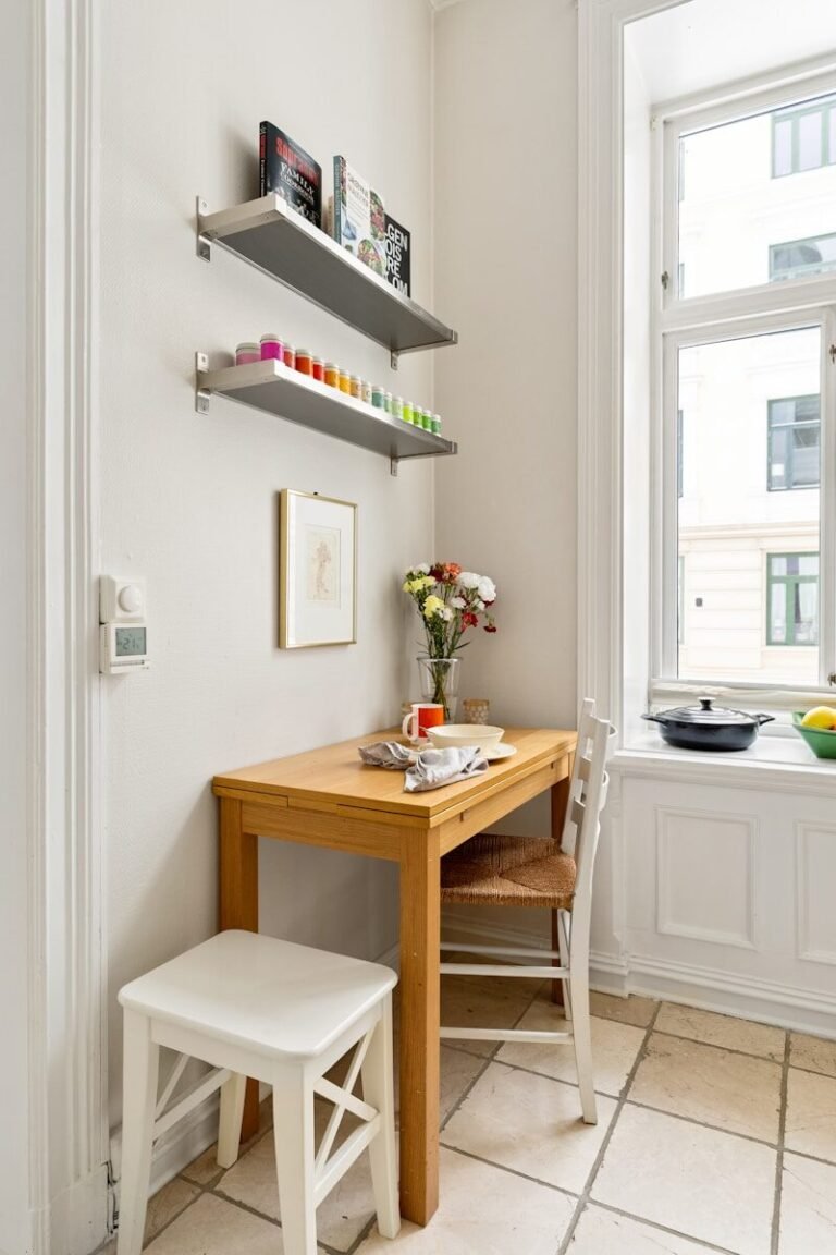 A room with a desk and a window